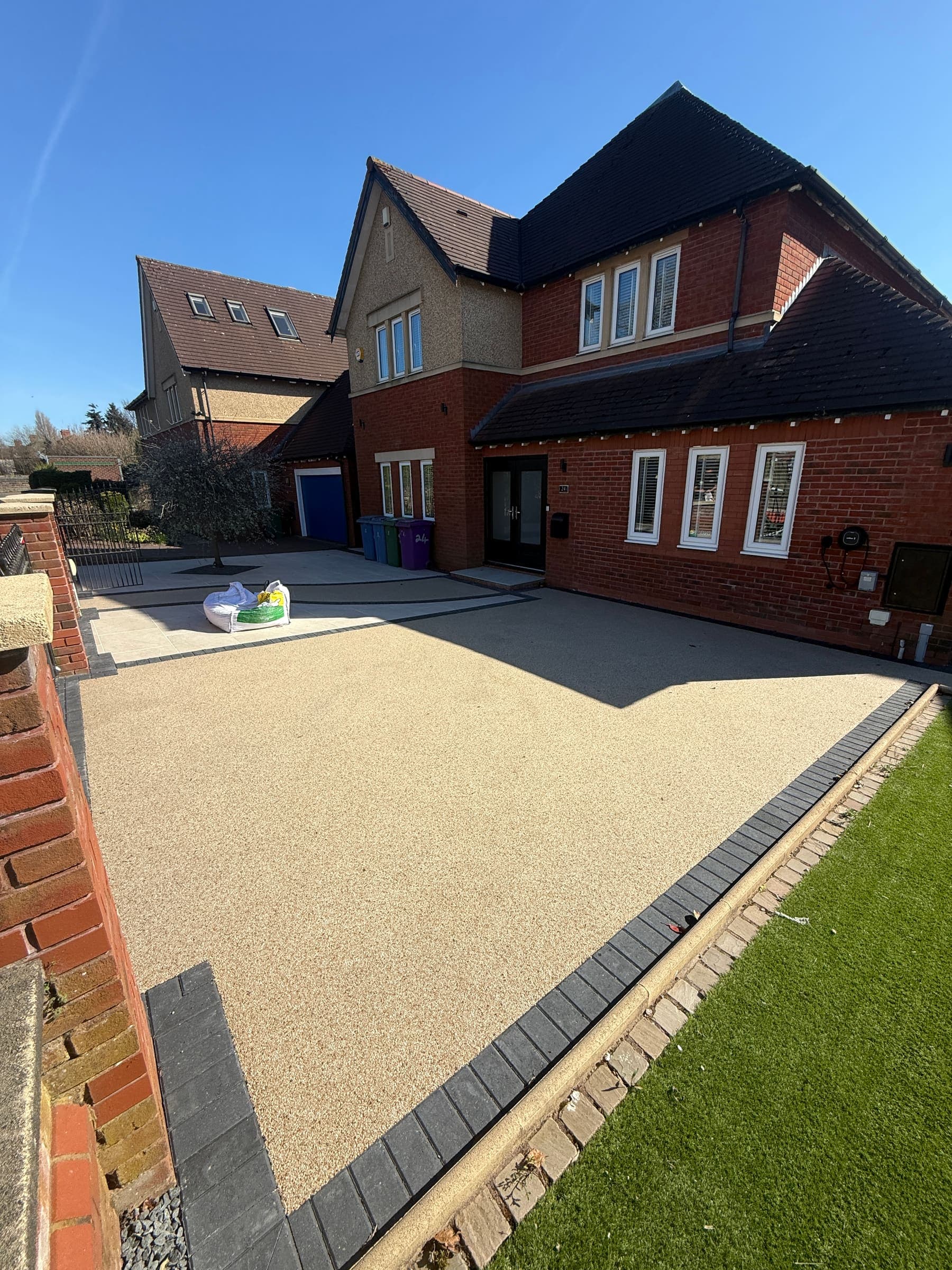 Resin bound driveway across a large landscaped frontage in Liverpool